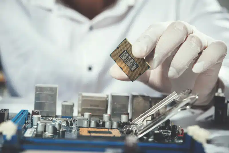 technician installing a cpu