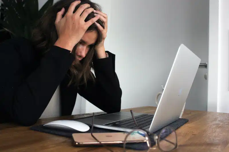 woman upset at computer malfunction